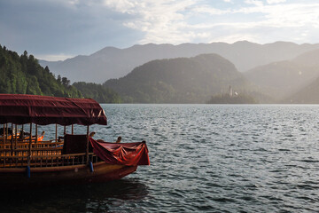 Wooden boats in the Lake Bled, the most famous lake in Slovenia with the island with the church