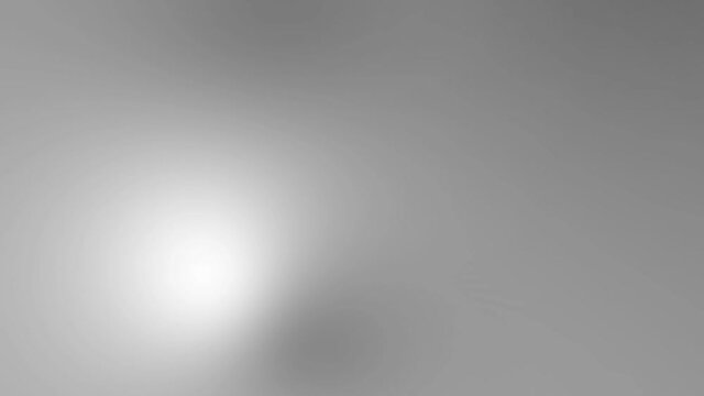 Abstract motion of white light moving on gray background