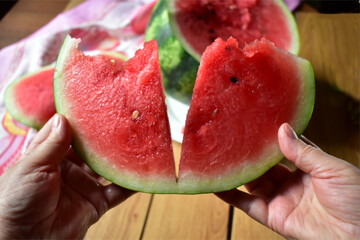 water melon on the hand