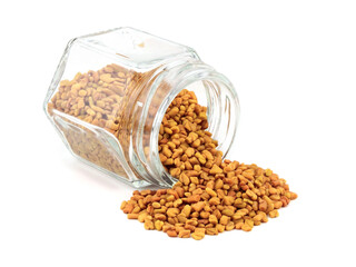 Fenugreek Seed (Methi Dana) Culinary Herb Spice in a Jar. Isolated on White Background.