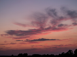 Fototapeta premium Wolkenhimmel bei Sonnenuntergang