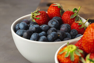 Close up photo of blueberries and strawberries