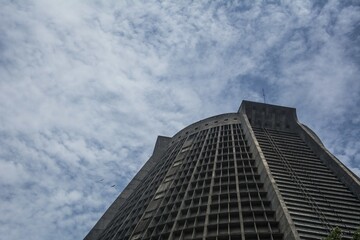 Low angle shot of a building under the cloudy sky in Brazil