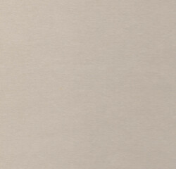 Texture of surface of cardboard of grey color.