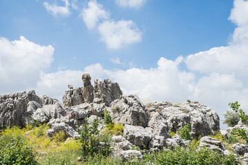 Fototapeta na wymiar Rock formations with cloudy sky in Faqra, Lebanon