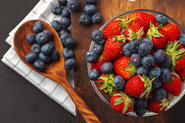 Close up photo of blueberries and strawberries
