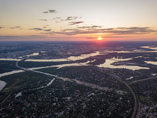 Sunset over the Dnieper River in Kiev. Aerial drone view.