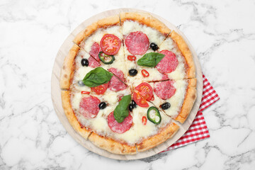 Delicious pizza Diablo on white marble background, top view