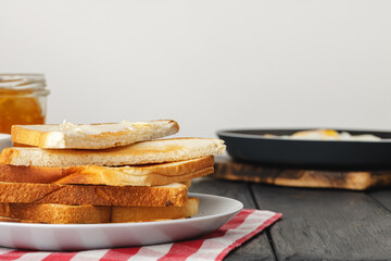 Simple breakfast. Toasted bread covered with butter