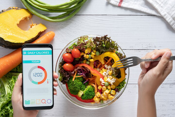 Calories counting , diet , food control and weight loss concept. Calorie counter application on...