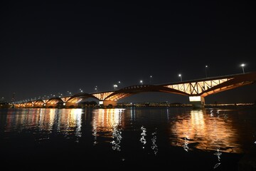 Fototapeta na wymiar Illuminated bridge in Han-River In Seoul, South Korea