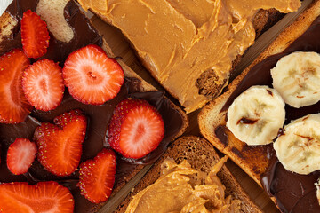 Sandwich toast with chocolate paste and cut strawberry