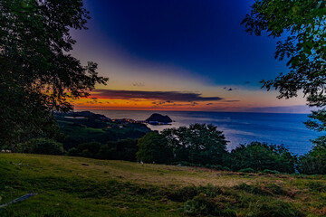 Puesta de sol desde Zarautz al ratón de Getaria