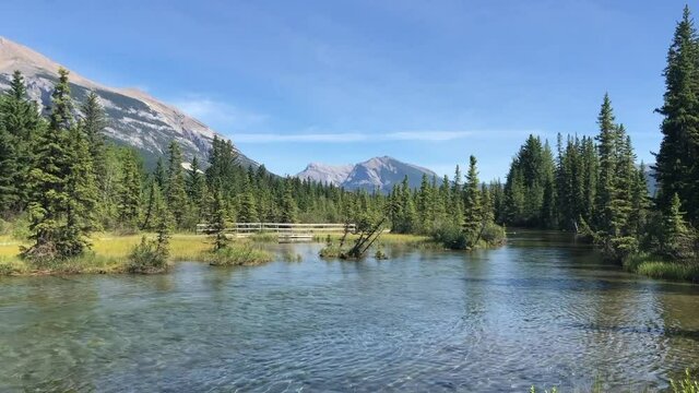 mountains with river blue sky