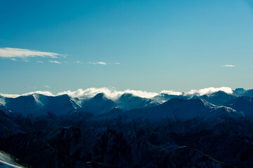 Fototapeta na wymiar Winter landscape of snow mountain against blue sky in South island, New Zealand.