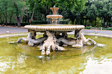 Roman fountain in Villa Borghese, Italy.