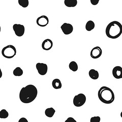 Doodle circles seamless pattern. Black dots texture background.