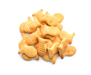 Delicious crispy goldfish crackers on white background