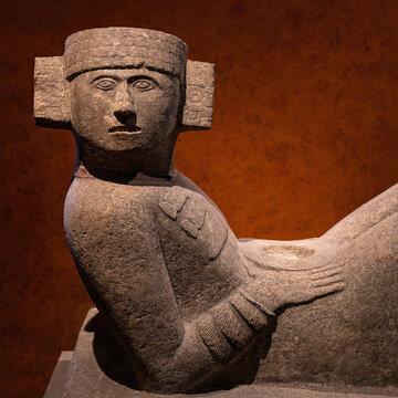 A Chac Mool sculpture of the Maya civilization with scale where hearts of human sacrifices were placed, Mexico City, Mexico.