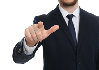 Businessman touching something against white background, focus on hand
