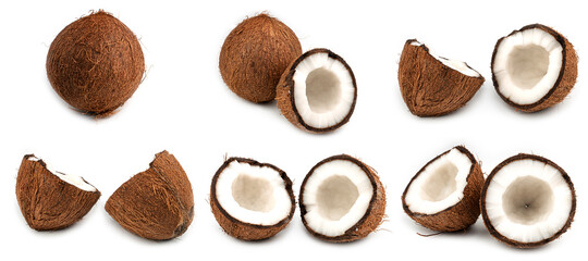 Halves of broken coconuts on a white background. Macro photo. Coconut set. High quality photo
