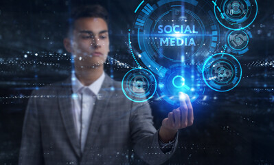 Business, Technology, Internet and network concept. Young businessman working on a virtual screen of the future and sees the inscription: Social media