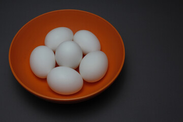 eggs in a bowl on Gray Background