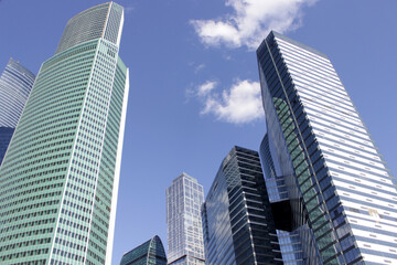 Plakat skyscrapers against the blue sky