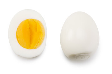 Single whole boiled egg with halved egg isolated on a white background. Top view