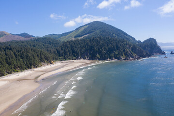 The Pacific Ocean meets a beautiful beach along the coastline of Oregon just north of the town of Manzanita. Everyone in Oregon has free beach access due to the Oregon Beach Bill of 1967.