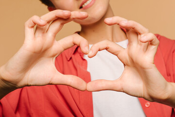 hands of a woman with a heart