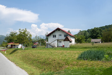 Fototapeta na wymiar The Rural houses by the road in Montenegro