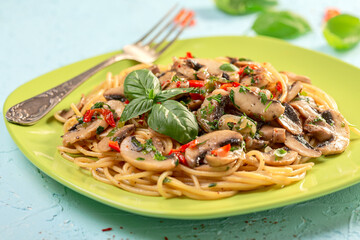 Italian pasta with mushrooms and hot sauce.