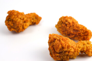 Crispy fried chicken on a white background