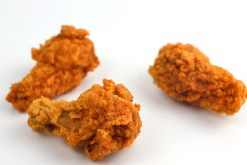 Crispy fried chicken on a white background