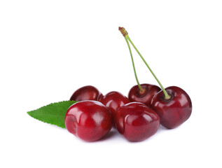Tasty ripe red cherries with green leaf isolated on white