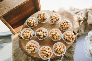 Delicious miniature cakes in buffet trays. Event dessert with delicious cakes for night party