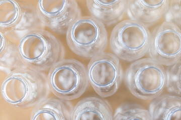 Used sorted for recycling plastic bottles, the concept of recycling waste, ecology, land pollution on a wooden background. low angle view