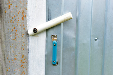 Steel door wicket with rubber lock and handle