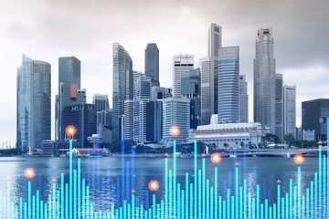Financial stock chart hologram over panorama city view of Singapore, business center in Asia. The concept of international transactions. Double exposure.