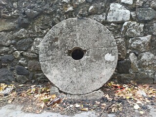 round rock near a wall