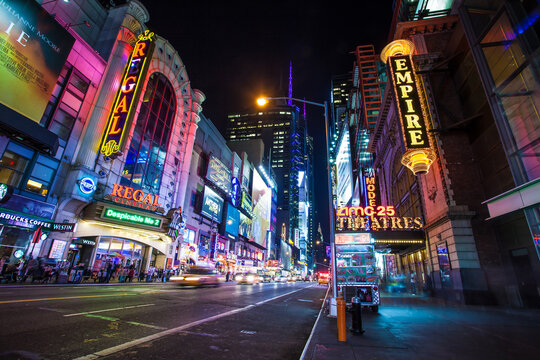 New York, NY / USA - 10/2/2013: New York midtown at night with illuminated signs