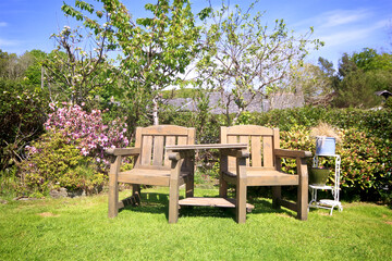 Obraz premium wooden chairs in the garden