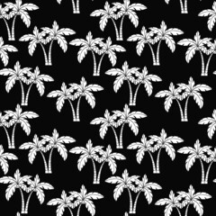 seamless pattern, in black and white, silhouettes of palm trees, ornamental for wallpaper and fabric, background for design