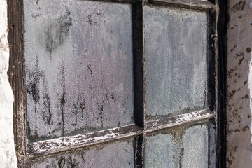 Old window frame with condensation 