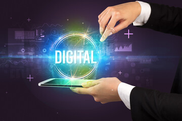 Close-up of a touchscreen with DIGITAL inscription, new technology concept