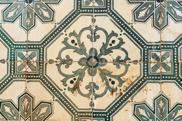 Close up on traditional portuguese Azulejos, ceramic tiles on the facade of a house in Lisbon Portugal