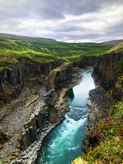 Obraz premium Stuðlagil Canyon, Incredible Basalt Columns in East Iceland