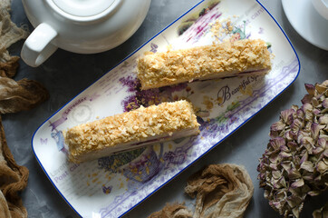 Puff pastry napoleon with cream and cherry