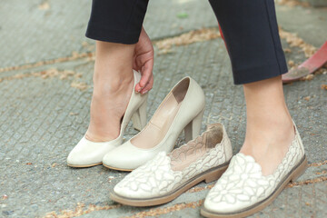 high and flat shoes in street